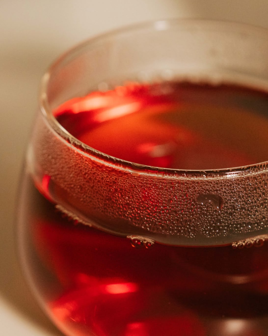 Deep amber infusion of Autumn Flush in a glass