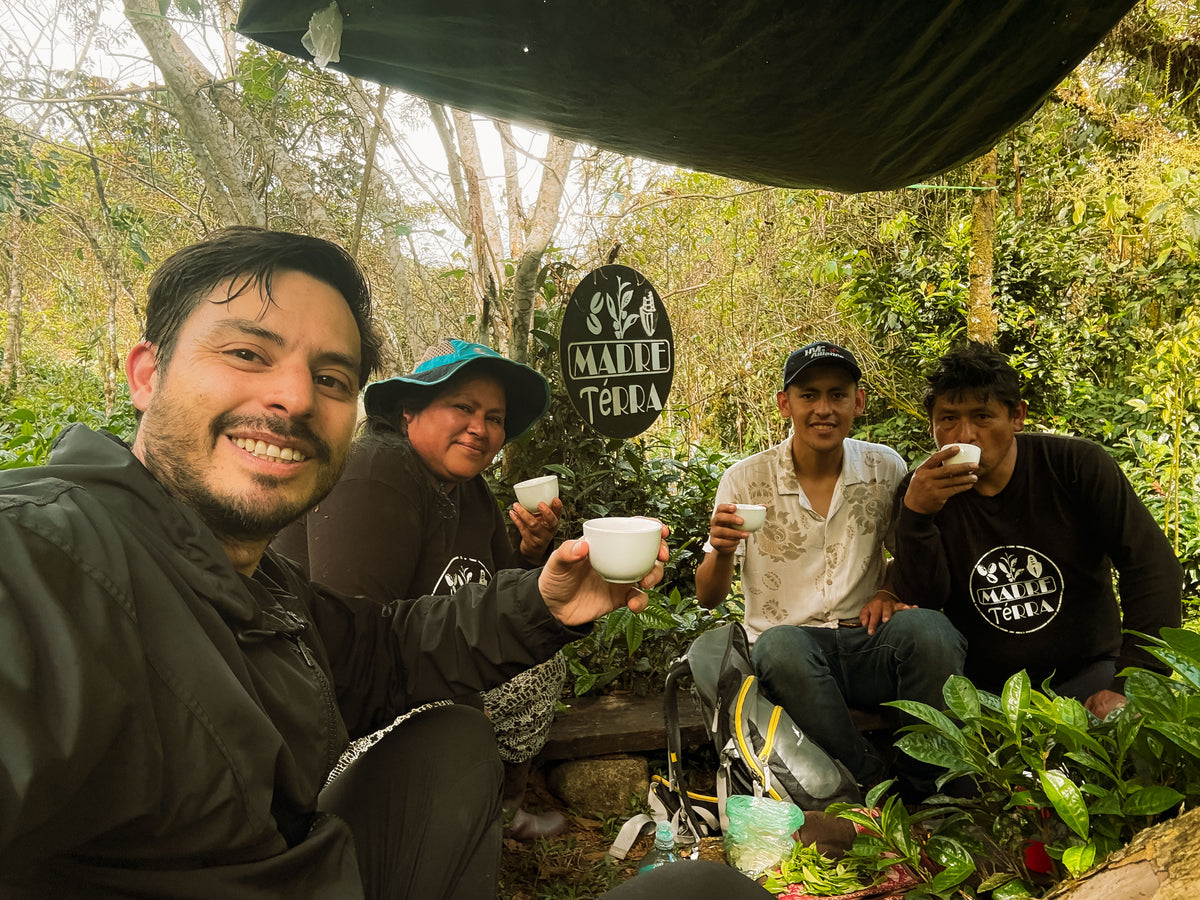 Eduardo toasting with tea farmers in Peru