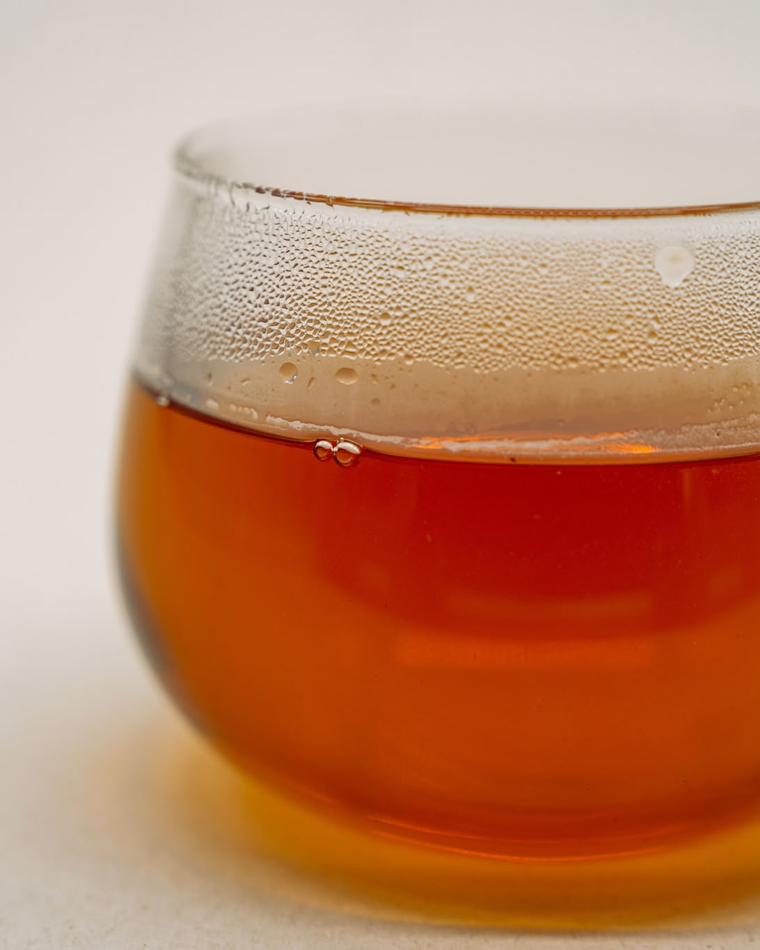 Amber infusion of Second Musk Flush in a glass