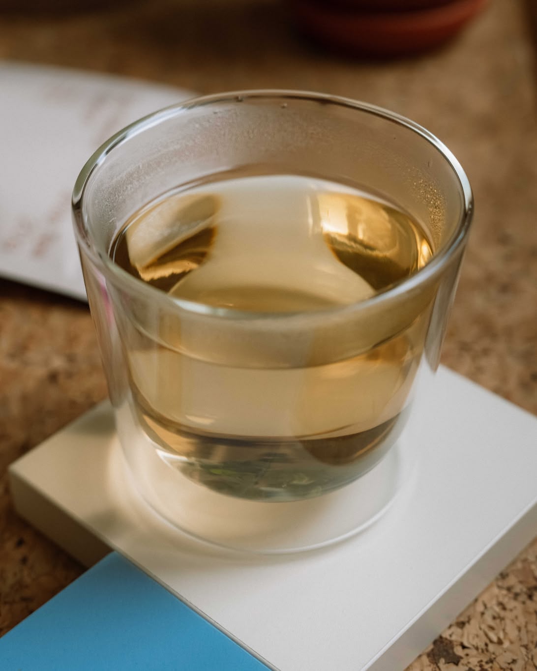 Pale golden infusion of Silver Needle Full Moon in a glass